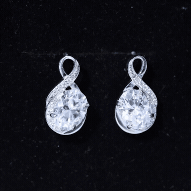 4 Carat Oval Cut Moissanite Infinity Stud Earrings in Silver D-VS1 92.5 Sterling Silver - Rosec Jewels