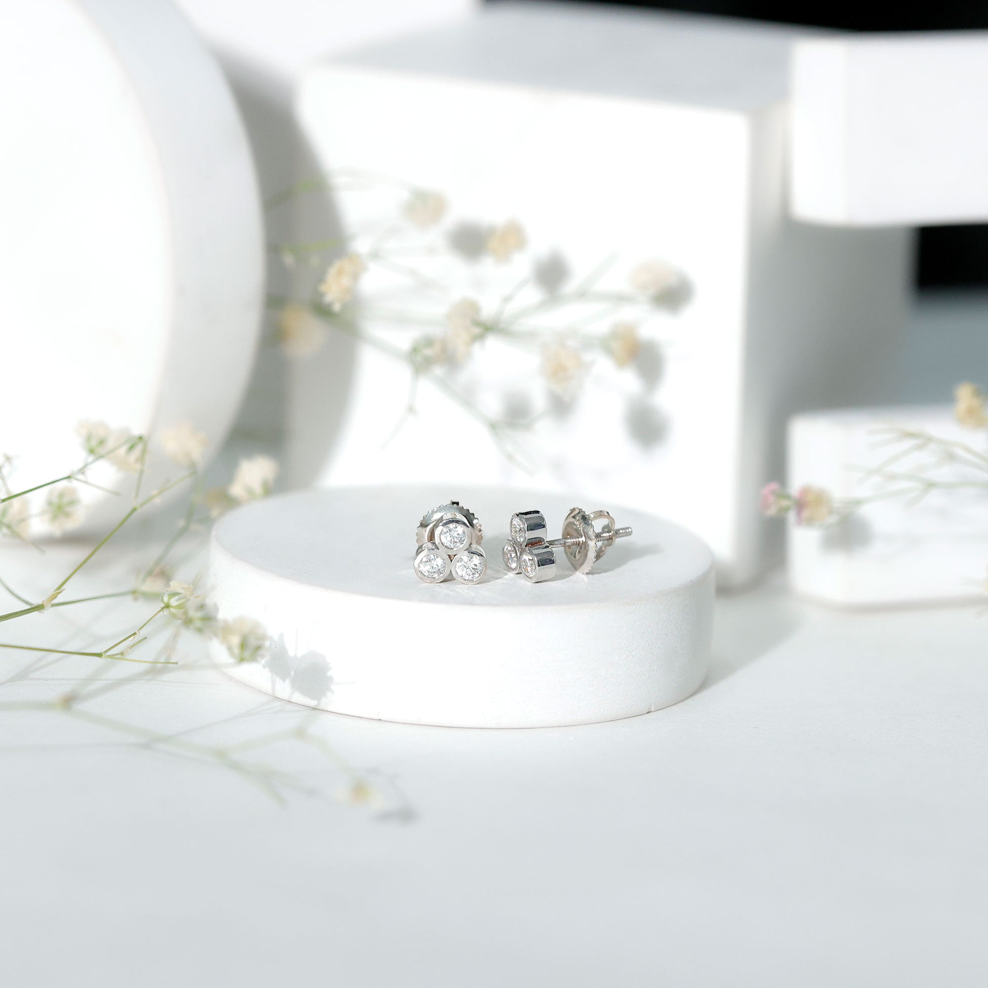 Bezel Set Round Cut Moissanite Three Stone Stud Earrings D-VS1 - Rosec Jewels