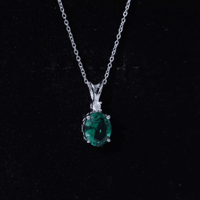Oval Created Emerald and Moissanite Solitaire Pendant AAAA - Rosec Jewels