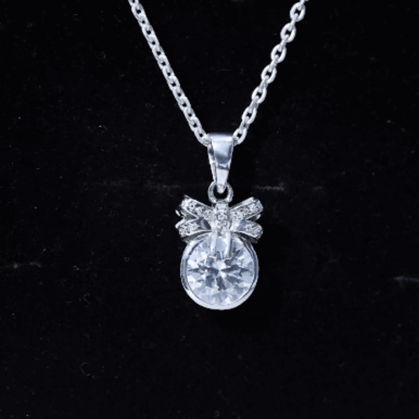 Bezel Set 2 Carat Moissanite Pendant with Bow D-VS1 92.5 Sterling Silver - Rosec Jewels