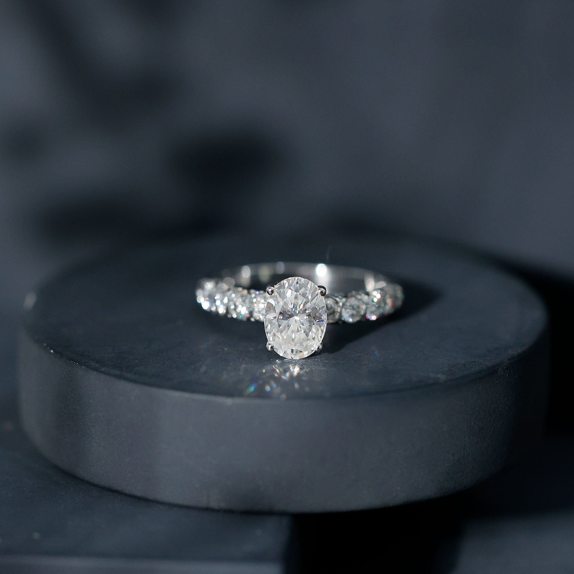Rosec Jewels-Oval Moissanite Solitaire Engagement Ring with Side Stones