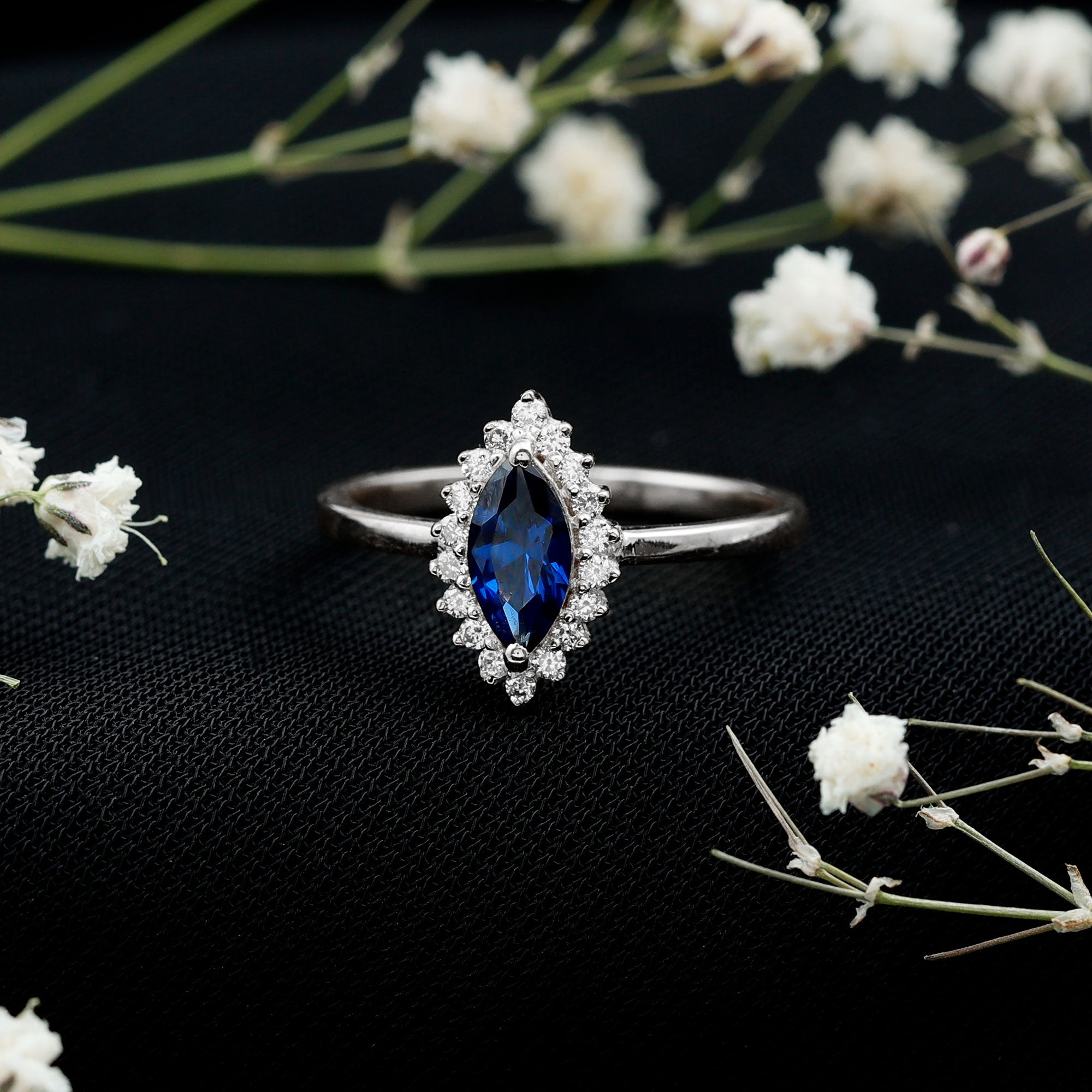Rosec Jewels-Marquise Cut Lab Grown Blue Sapphire and Diamond Halo Engagement Ring