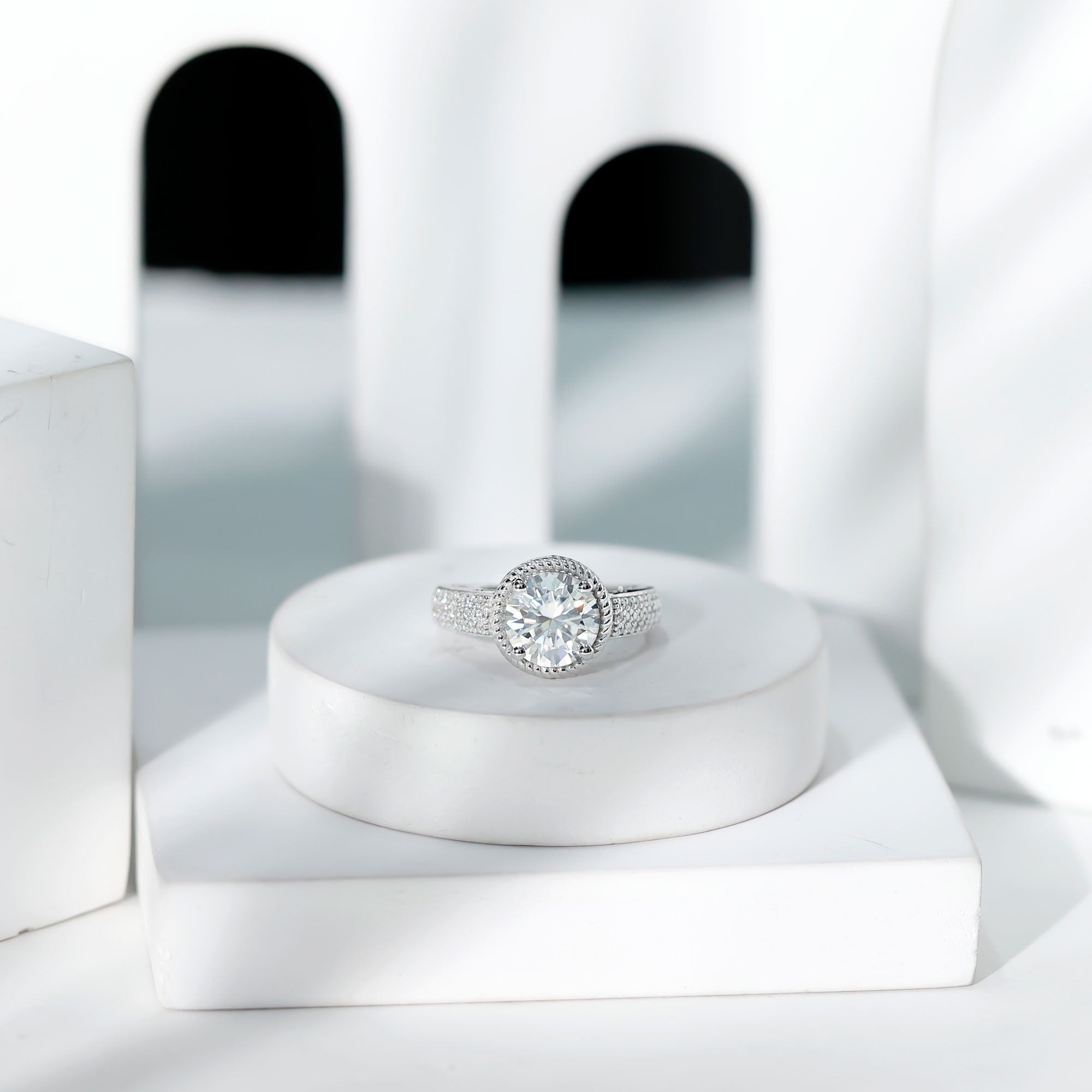 Rosec Jewels-2 Carat Moissanite Round Cut Engagement Ring With Side Stones