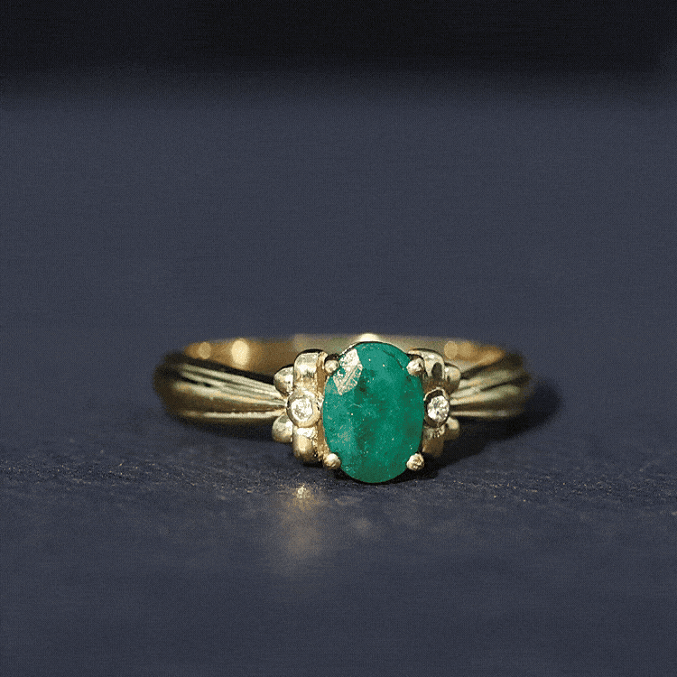 Rosec Jewels-Oval Cut Emerald Solitaire Engagement Ring with Bow Design
