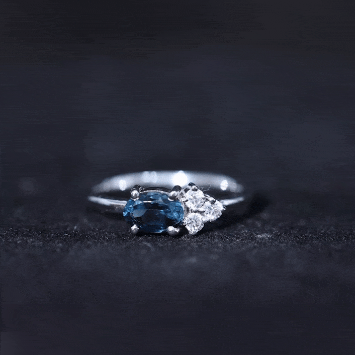 0.4 Carat Oval Cut London Blue Topaz East West Promise Ring with Diamond Trio AAA - Rosec Jewels