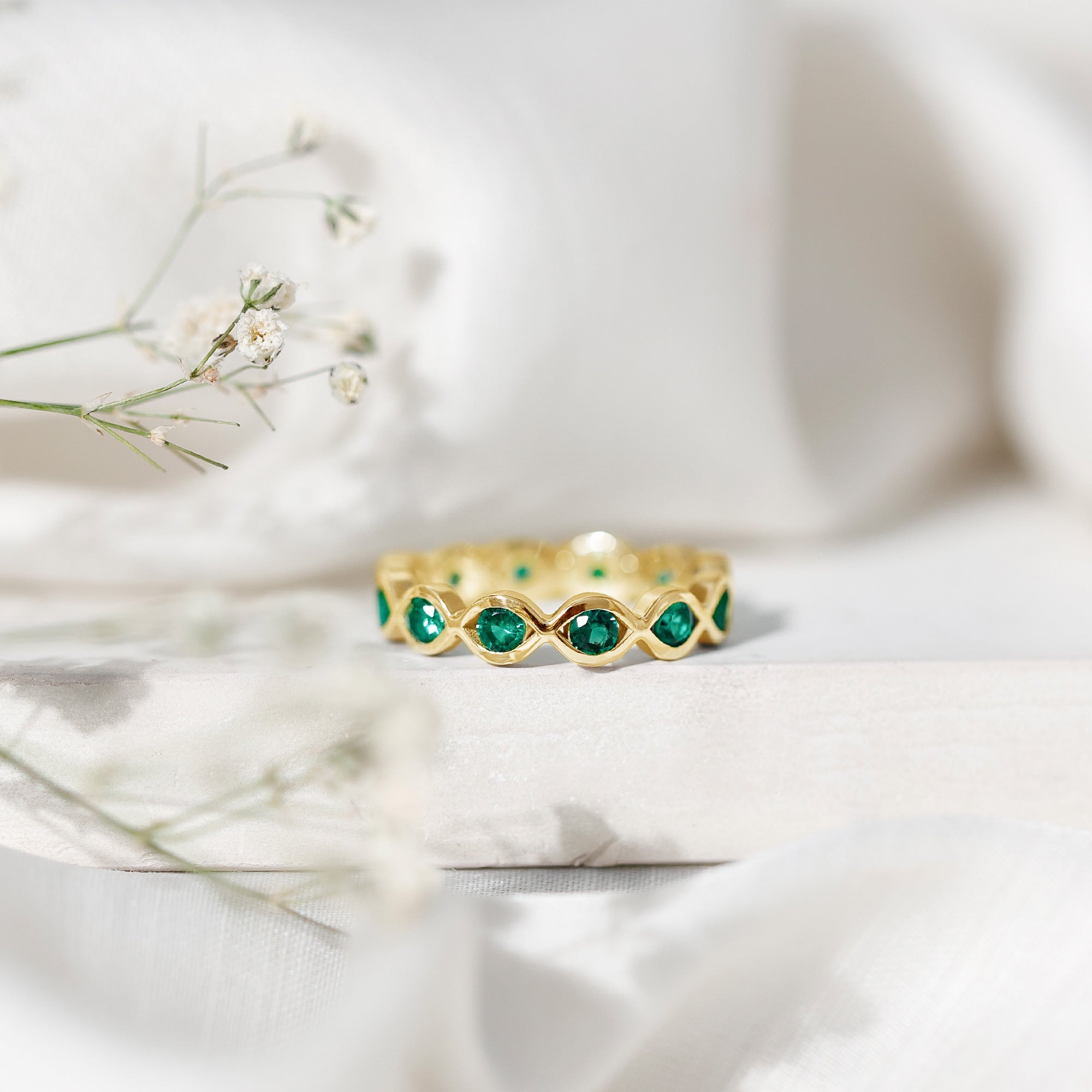 Certified Lab Grown Emerald Infinity Twisted Eternity Ring AAAA - Rosec Jewels