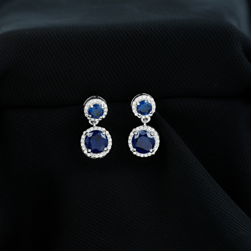 Rosec Jewels - 3 CT Created Blue Sapphire and Moissanite Halo Dangle Earrings in Silver
