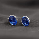 5X7 MM Oval Cut Created Blue Sapphire Solitaire Stud Earrings Lab Created Blue Sapphire - ( AAAA ) - Quality - Rosec Jewels