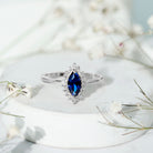 Rosec Jewels-Marquise Cut Lab Grown Blue Sapphire and Diamond Halo Engagement Ring