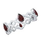 Rosec Jewels-Natural Pear Shape Garnet Diamond Eternity Ring with Crossover Shank