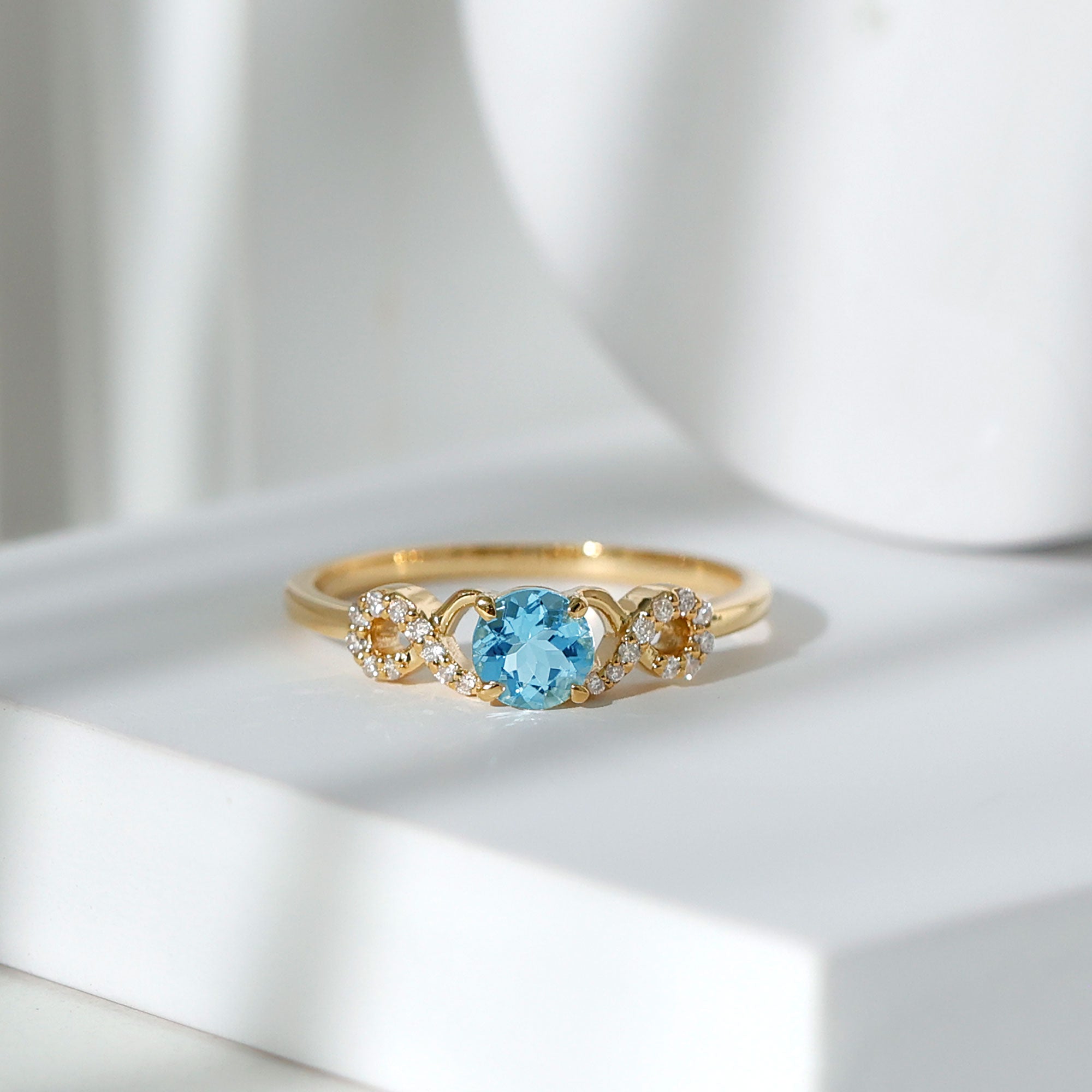 Rosec Jewels-Round Shape Aquamarine and Diamond Infinity Engagement Ring
