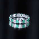 Rosec Jewels-Oval Emerald and Moissanite Eternity Wedding Band