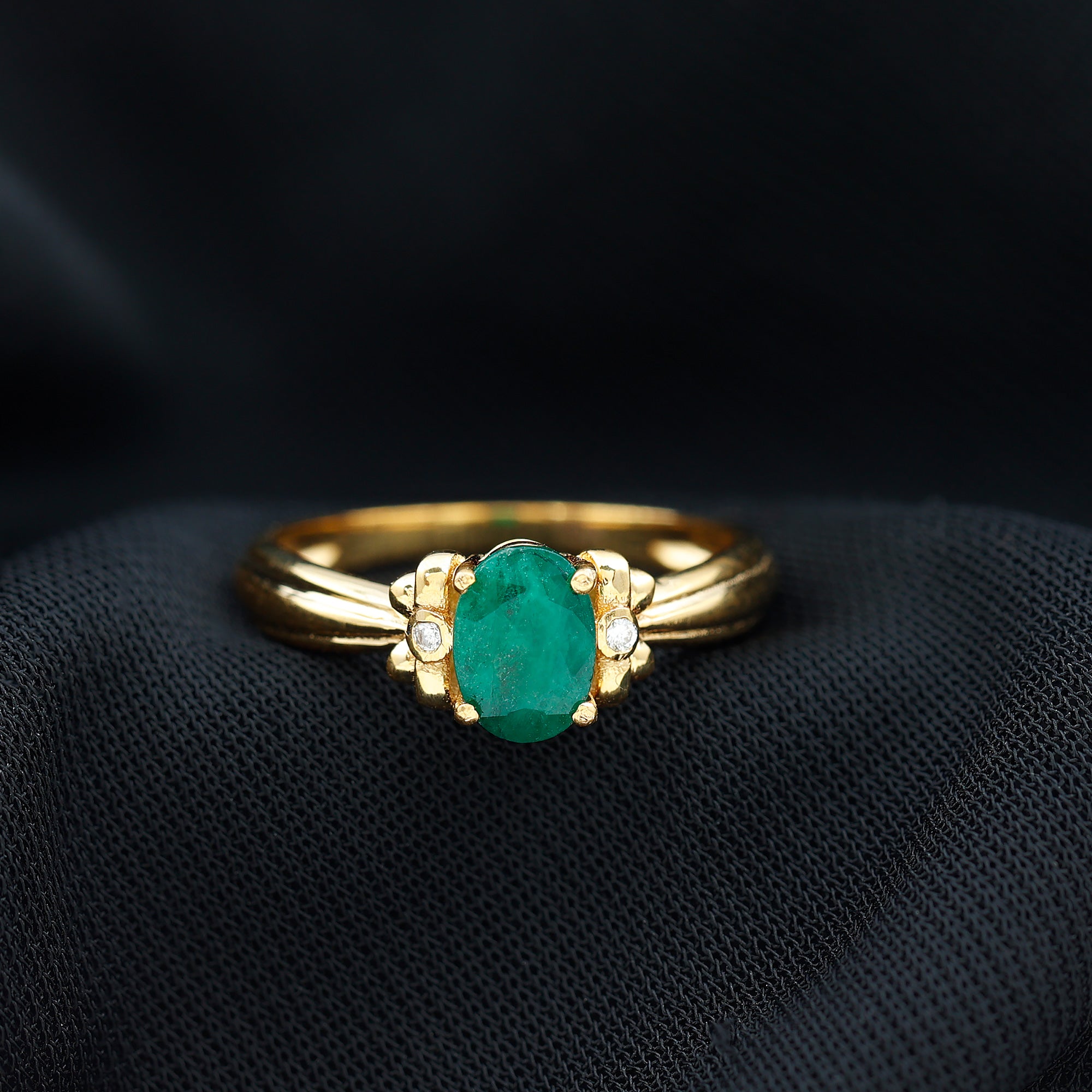 Rosec Jewels-Oval Cut Emerald Solitaire Engagement Ring with Bow Design