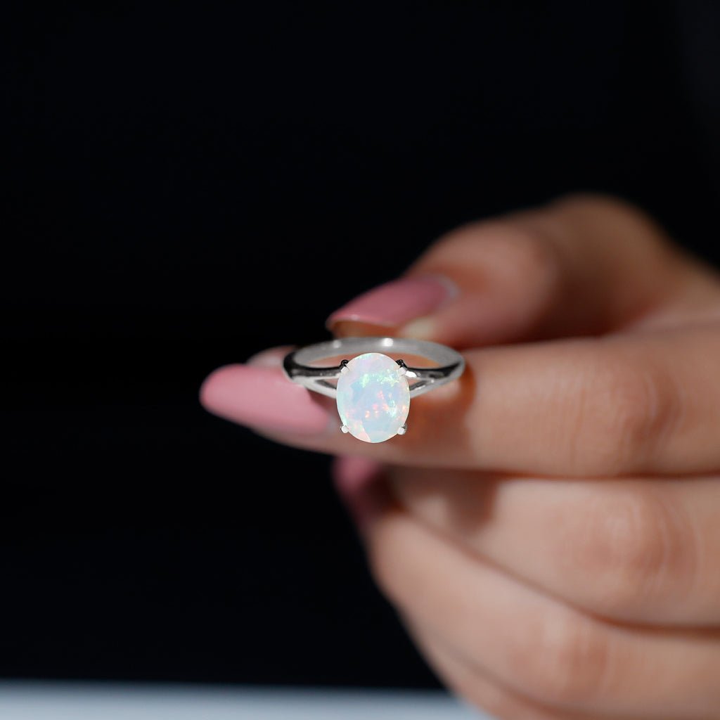 Rosec Jewels-Oval Ethiopian Opal Solitaire Ring in Split Shank