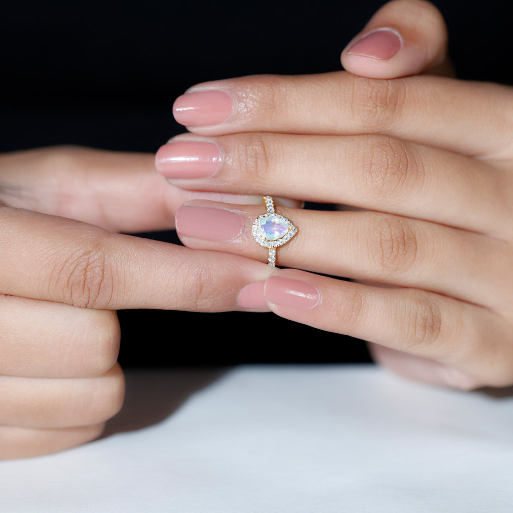 Rosec Jewels-1 CT Ethiopian Opal Teardrop Engagement Ring with Diamond