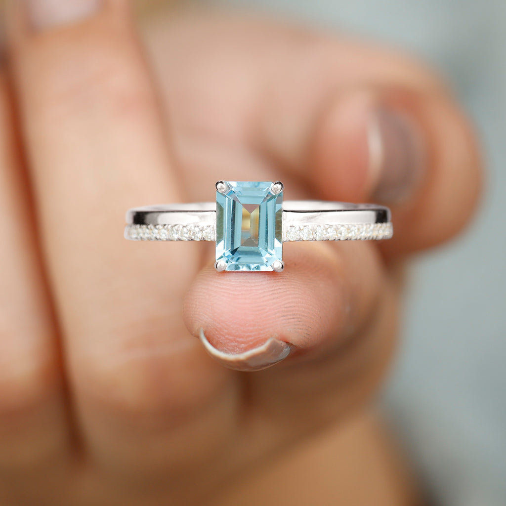 Rosec Jewels - Solitaire Engagement Ring with Emerald Cut Sky Blue Topaz and Diamond