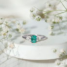 Rosec Jewels-Emerald Cut Emerald Engagement Ring with Diamond Trio