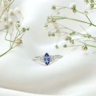 Rosec Jewels-Vintage Style Marquise Tanzanite Promise Ring with Diamond Trio