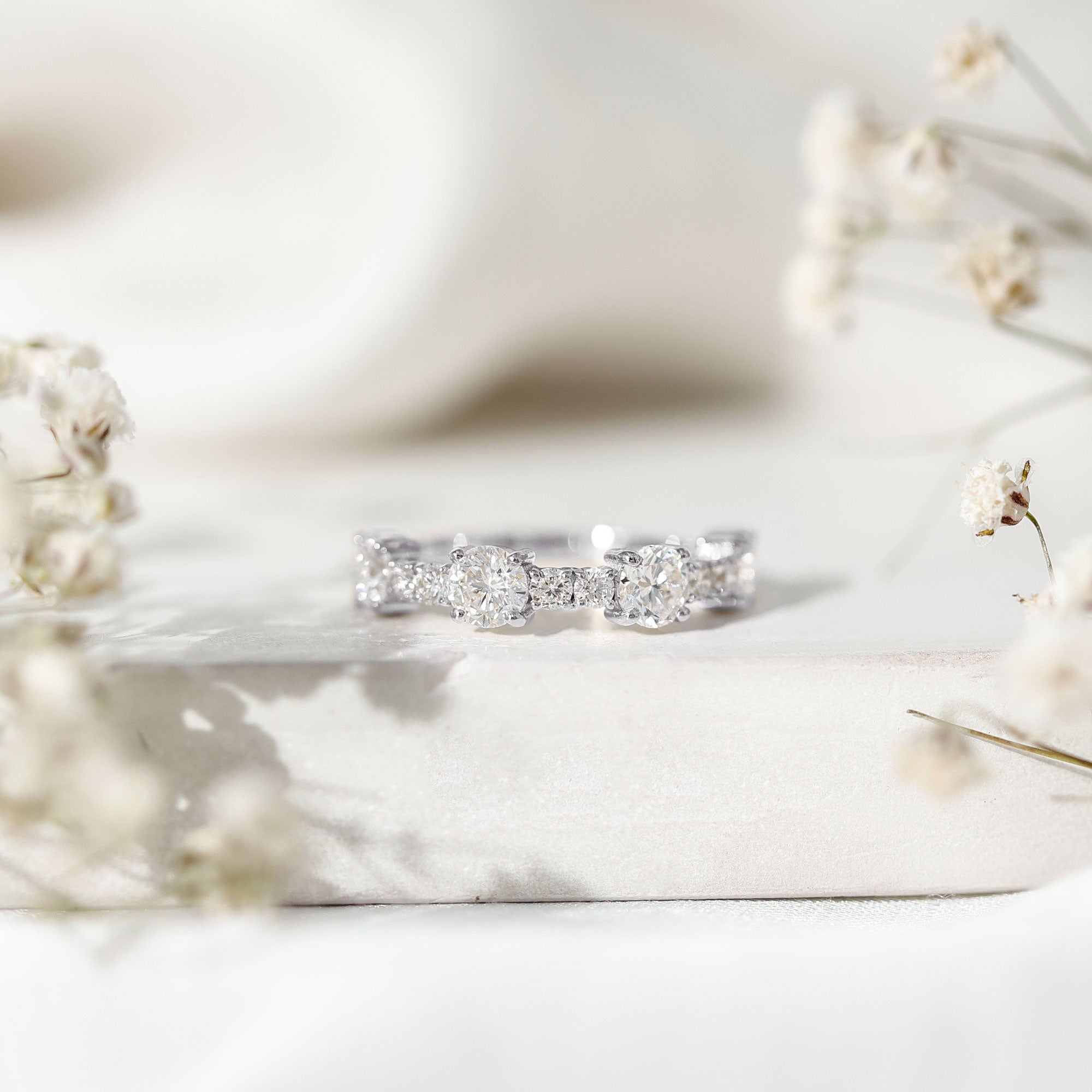 Rosec Jewels-Round Moissanite Half Eternity Wedding Band