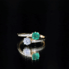 Rosec Jewels-Emerald and Moissanite Two Stone Engagement Ring in Bypass Shank
