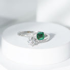 Rosec Jewels-Emerald and Moissanite Two Stone Engagement Ring in Bypass Shank
