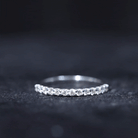 Rosec Jewels-Moissanite Half Eternity Ring in Shared Prong Setting