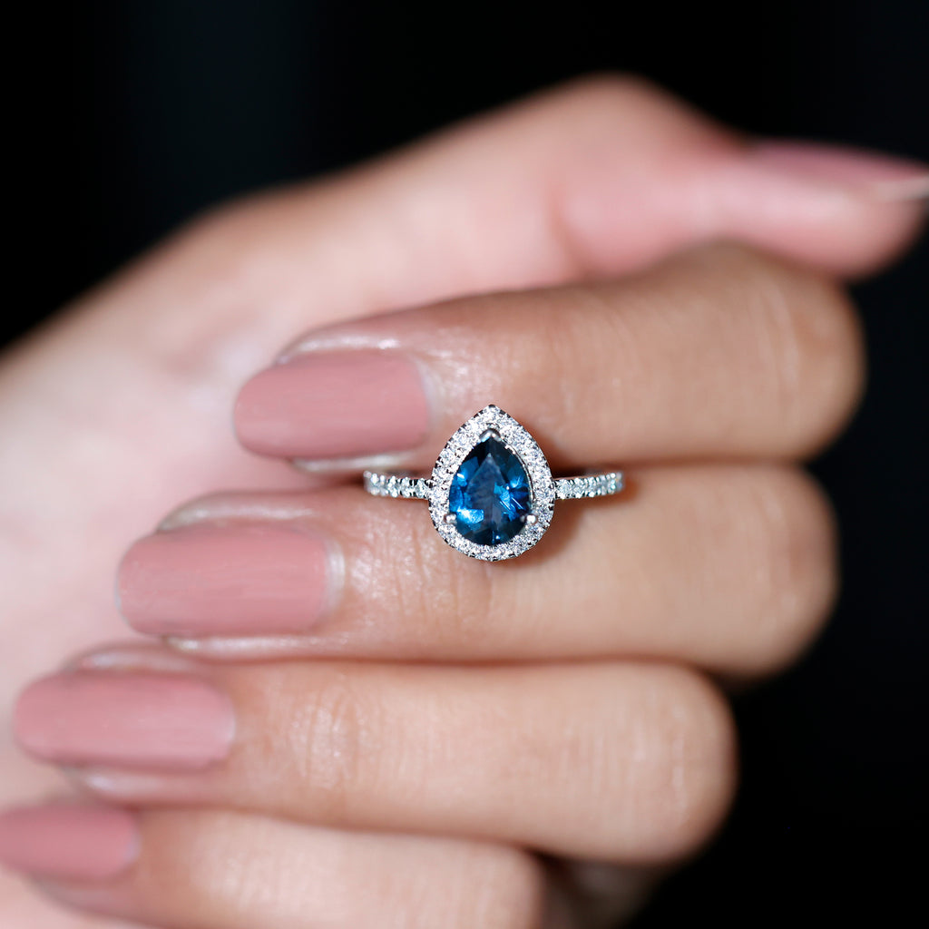 Rosec Jewels - 1.5 CT Teardrop London Blue Topaz Ring with Moissanite Halo