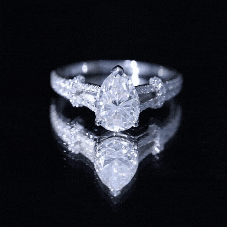 Rosec Jewels-Pear Shaped Moissanite Solitaire Engagement Ring in Split Shank