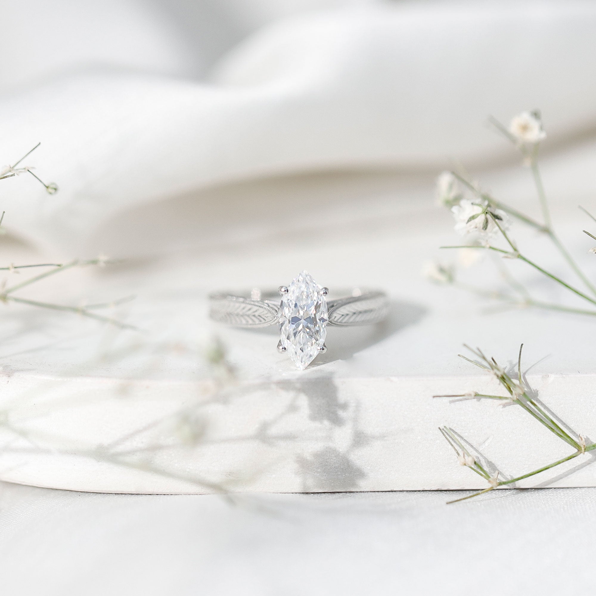 5x10mm Moissanite Marquise Engagement Ring with Leaf Engraved Shank D-VS1 - Rosec Jewels