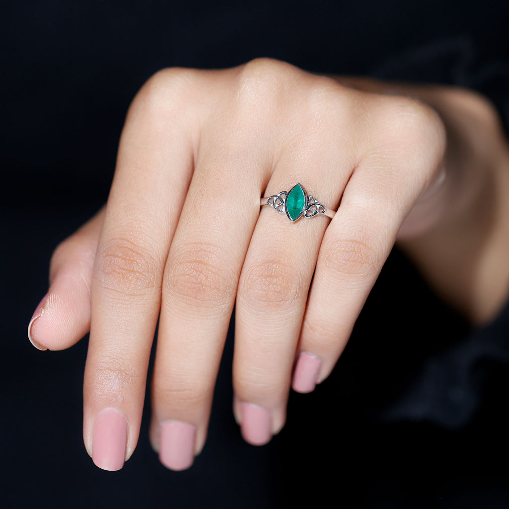 Marquise Cut Emerald Solitaire Celtic Ring in Bezel Setting