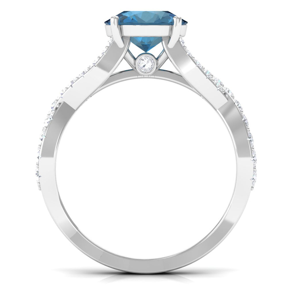 4 Prong Set Solitaire London Blue Topaz Crossover Ring with Moissanite Accent